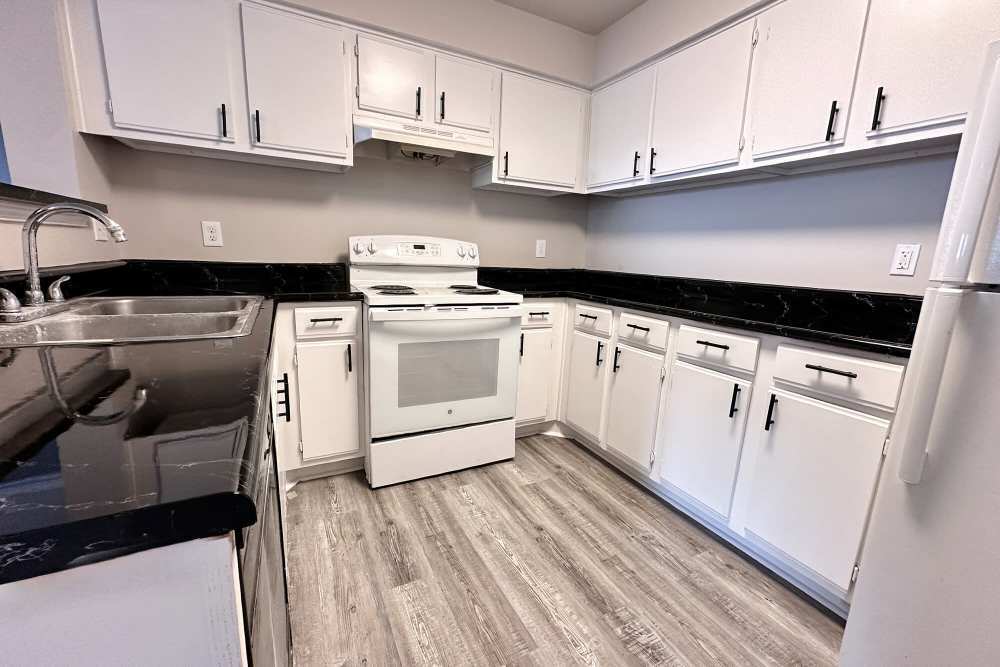 Kitchen with black color granite countertop at Gable Hills in Tulsa, Oklahoma