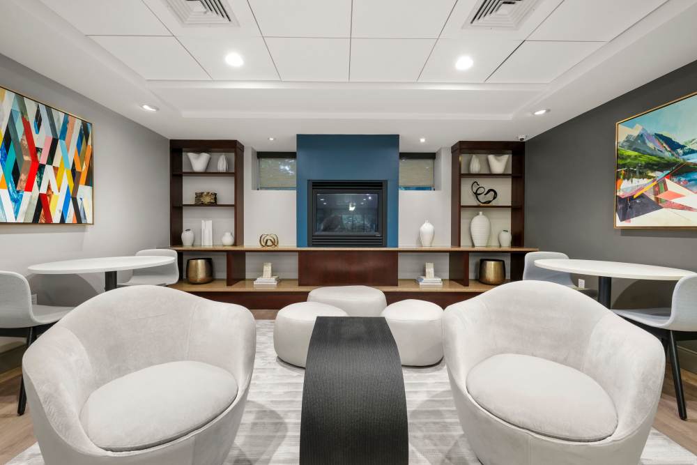 Community gathering space with a fireplace at Camelot Court in Brighton, Massachusetts