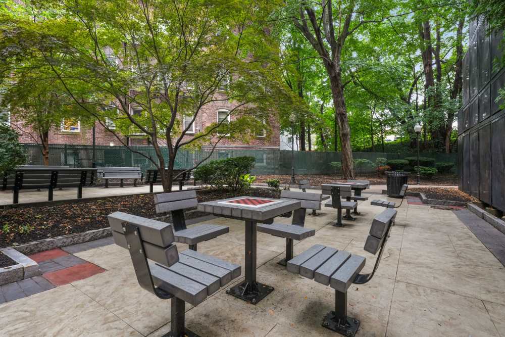 Courtyard with gaming tables at Camelot Court in Brighton, Massachusetts