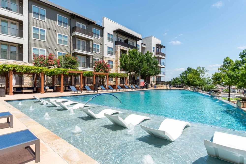 A serene pool in the park at the city's edge, situated in Henley at The Rim, San Antonio, Texas.