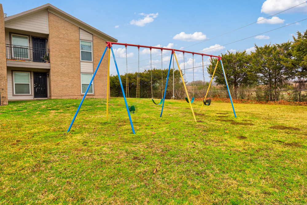 Outdoor playground at The Residence At Okemah in Okemah, Oklahoma, 
