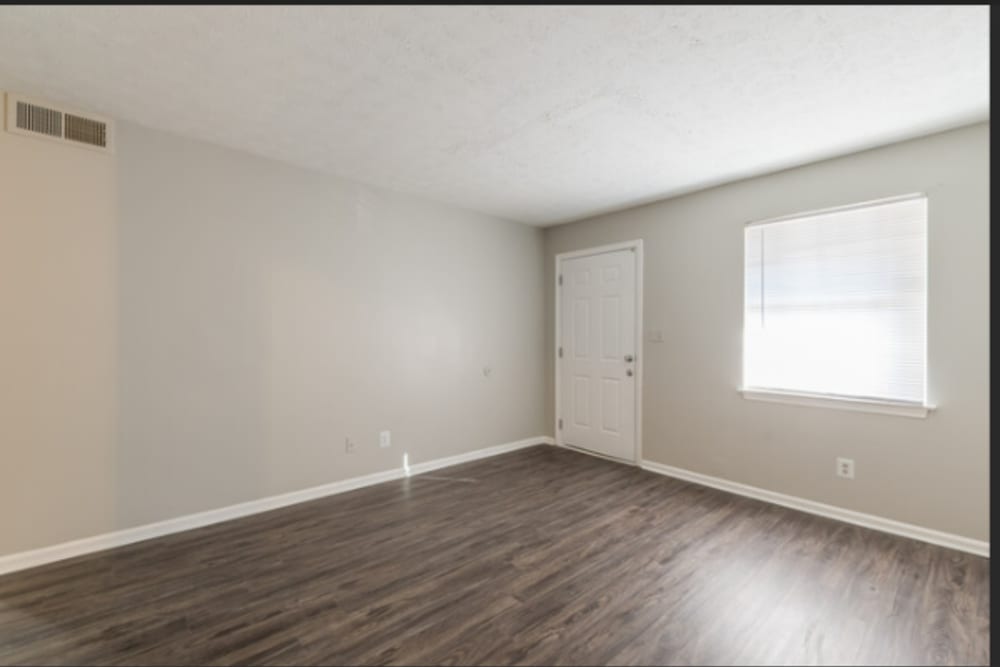 Living room with air conditioning at The Residence At Okemah in Okemah, Oklahoma, 