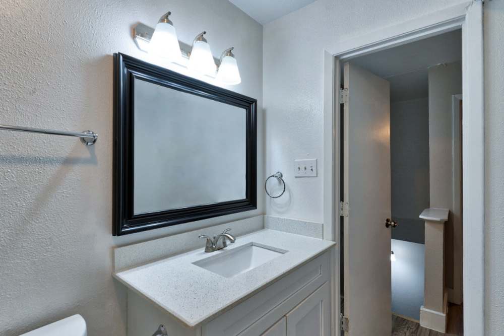 Apartment bathroom at Troup Townhomes in Troup, Texas