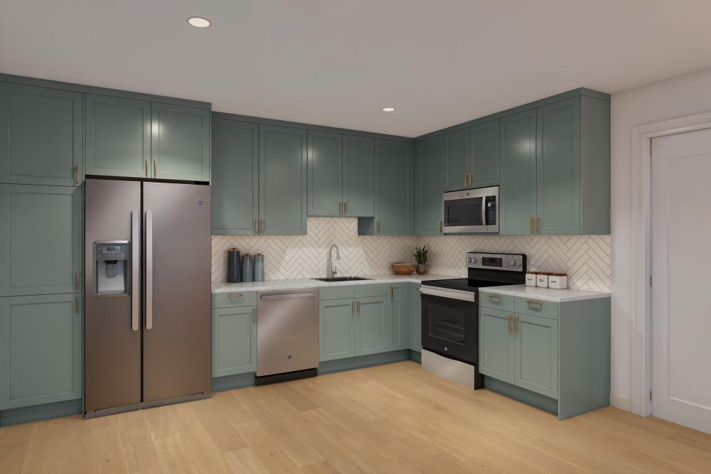 Charming kitchen with teal cabinetry, stainless steel appliances, and a white herringbone backsplash, complemented by wooden flooring and a well-organized layout at The Renaissance in Naples, Florida.