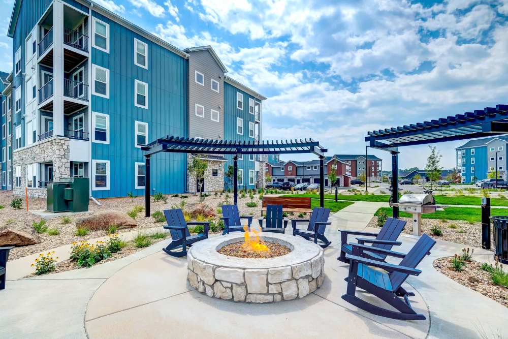 Outdoor firepit and chairs around it at Clear Creek Crossing in Wheat Ridge,Colorado
