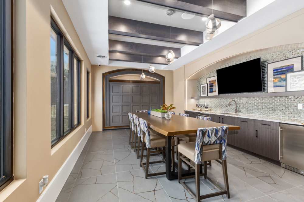 Resident community spaces with  ample natural light at Encore at West Valley in White Lake, Michigan