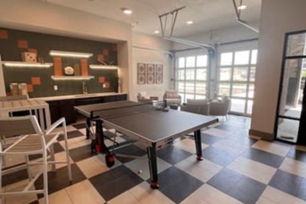 Interior of the game room at The Heyward Apartments in Corinth, Texas
