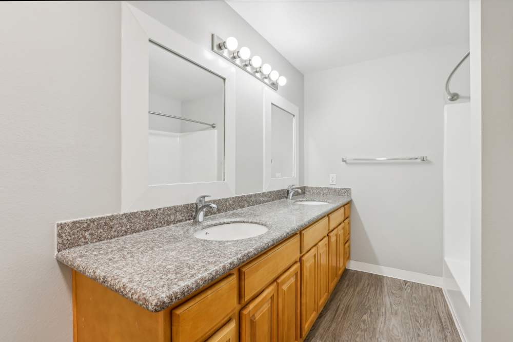Bath with vanity lighs  at Cascade Park Apartment Homes in Vancouver, Washington