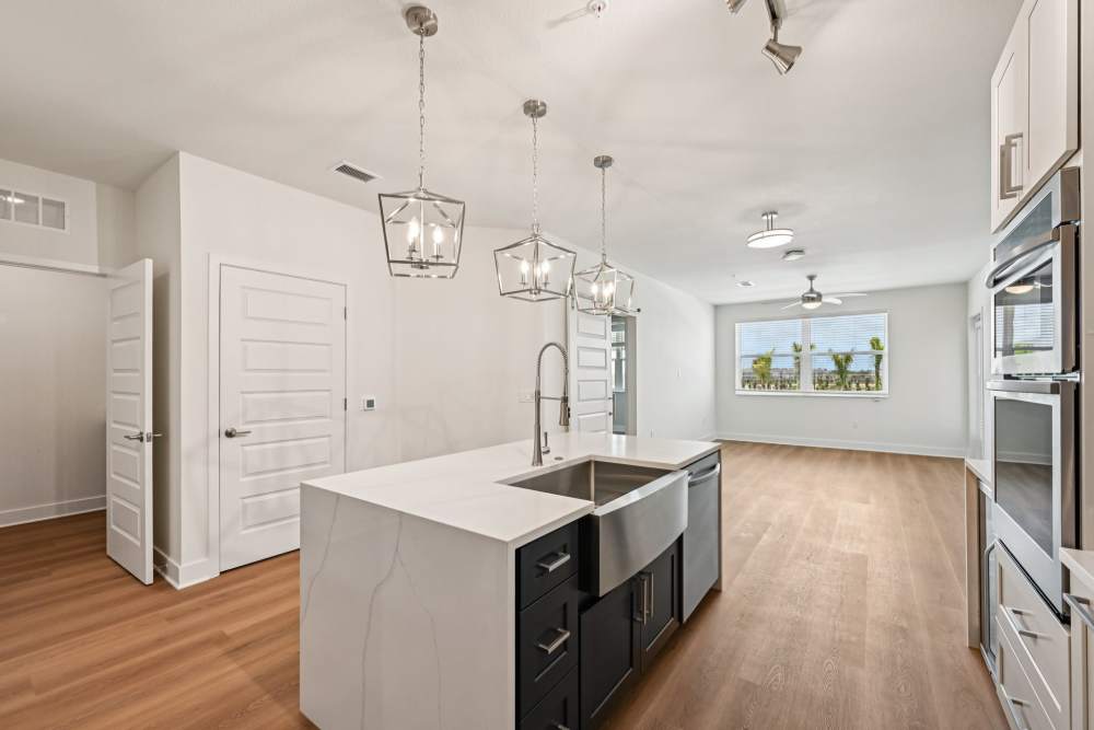 Kitchen with Wood-Style Flooring at The Vivien in Vero Beach, Florida
