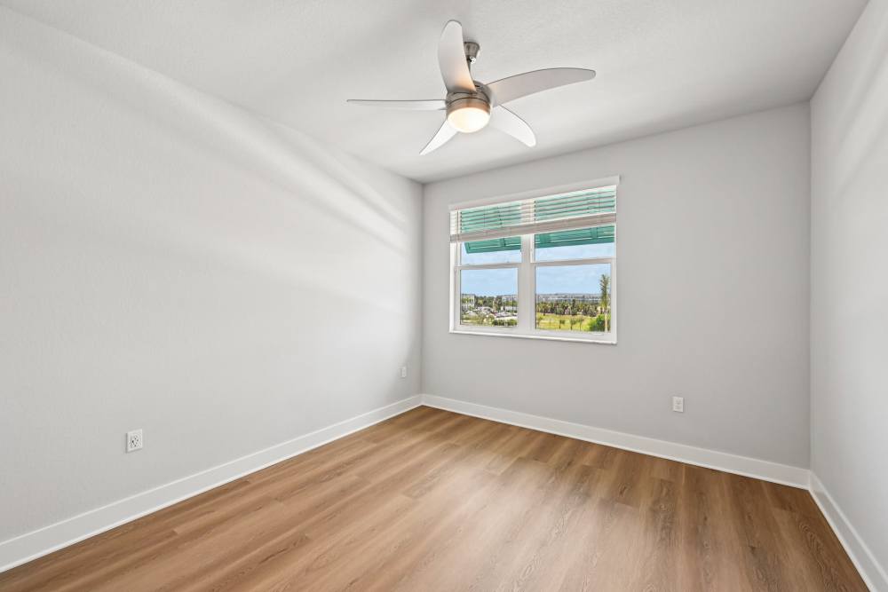 Empty Room with Wood-Style Flooring at The Vivien in Vero Beach, Florida