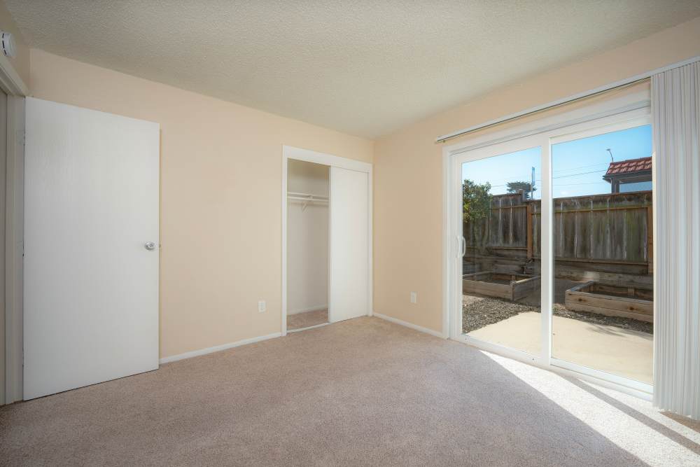 A room with a glass door at Villa Marina in Marina, California