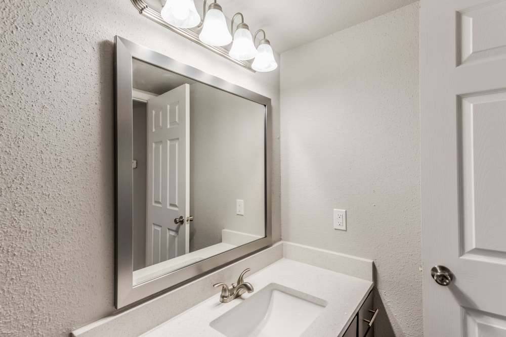 Well-lit bathroom at The Haven On Buoy in Webster, Texas