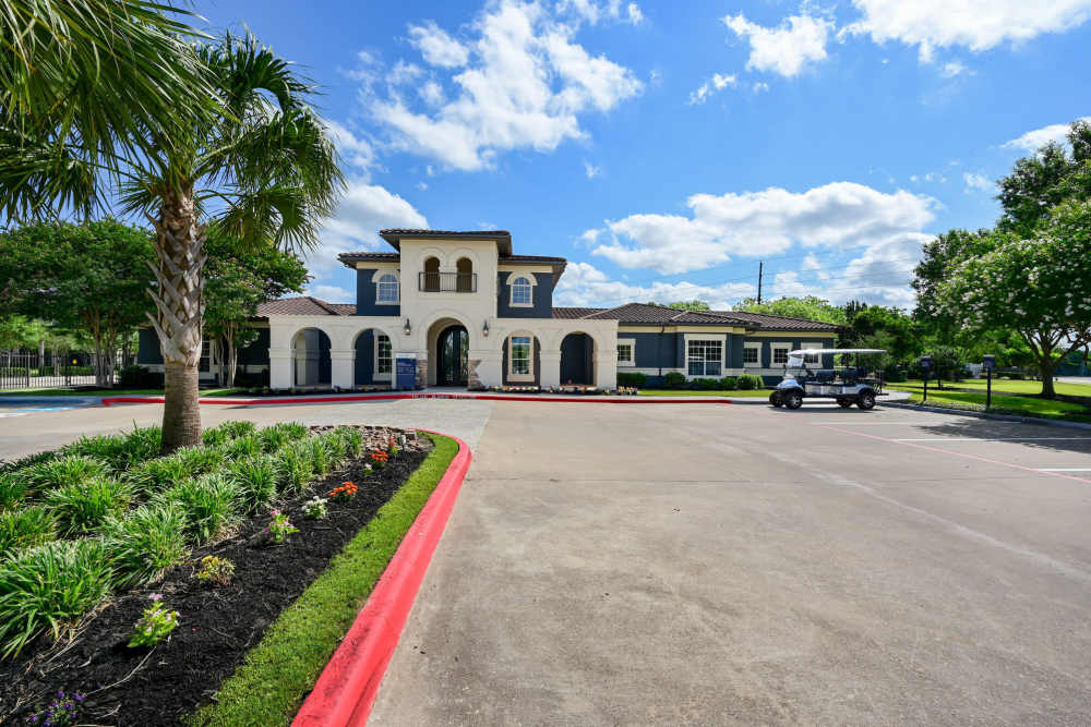 Property exterior with parking spots for the community at Vineyards in Katy,Texas