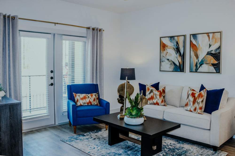 Resident Living Room  at The Heyward Apartments in Corinth, TX