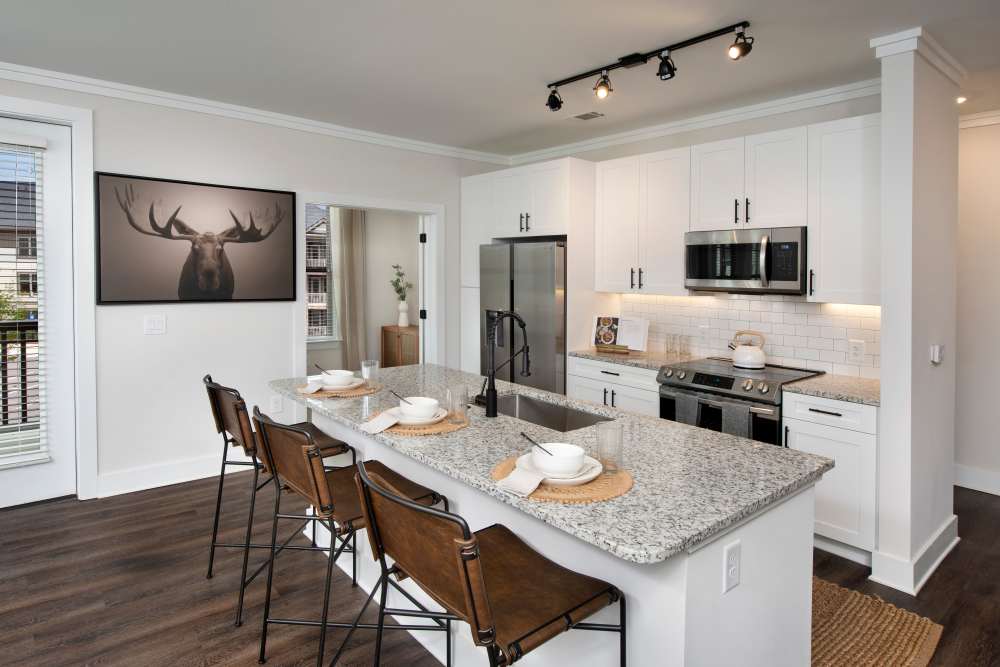 Kitchen with side-by-side refrigerator at Timberline View in Buford, Georgia