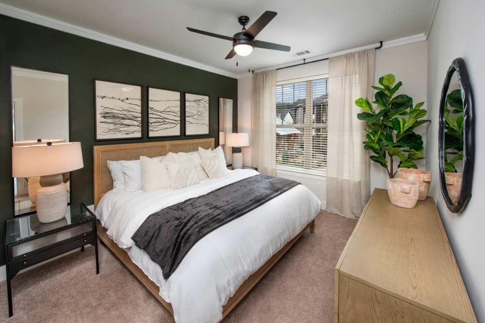 Bedroom with large window at Timberline View in Buford, Georgia