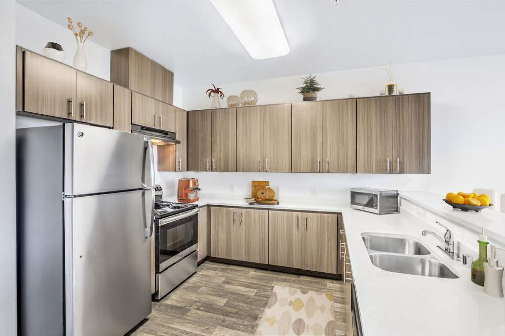 Kitchen with refrigerator at Harmony in Las Vegas, Nevada 
