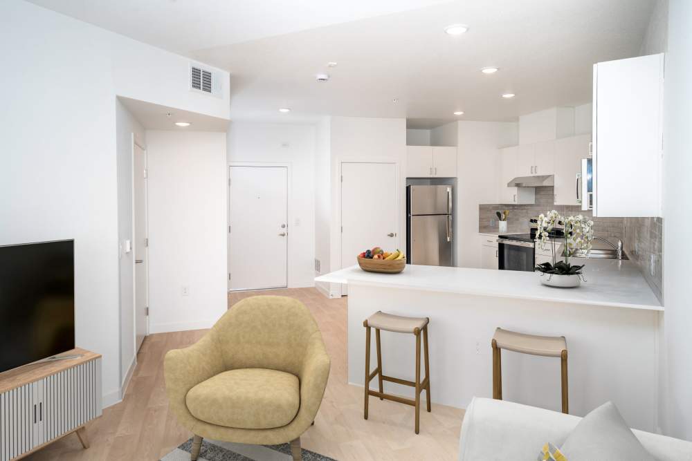 Kitchen with breakfast counter at Heirloom at Pebble in Las Vegas, Nevada