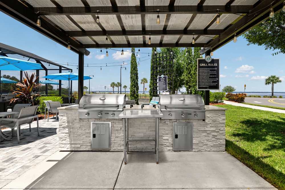 Covered grilling station near the pool at Vue on Lake Monroe in Sanford, Florida