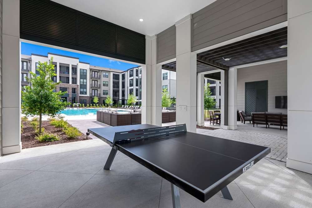 Table Tennis near the Pool at Westport Lofts in Belville, North Carolina