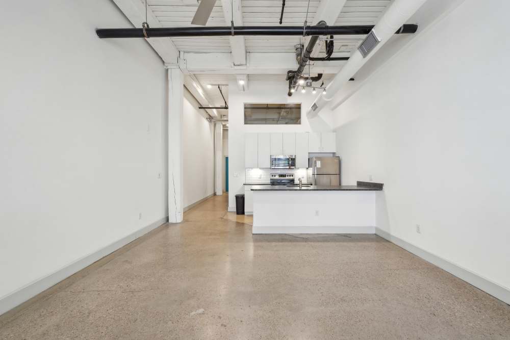 Kitchen with living room at South Bank in Richmond, Virginia  