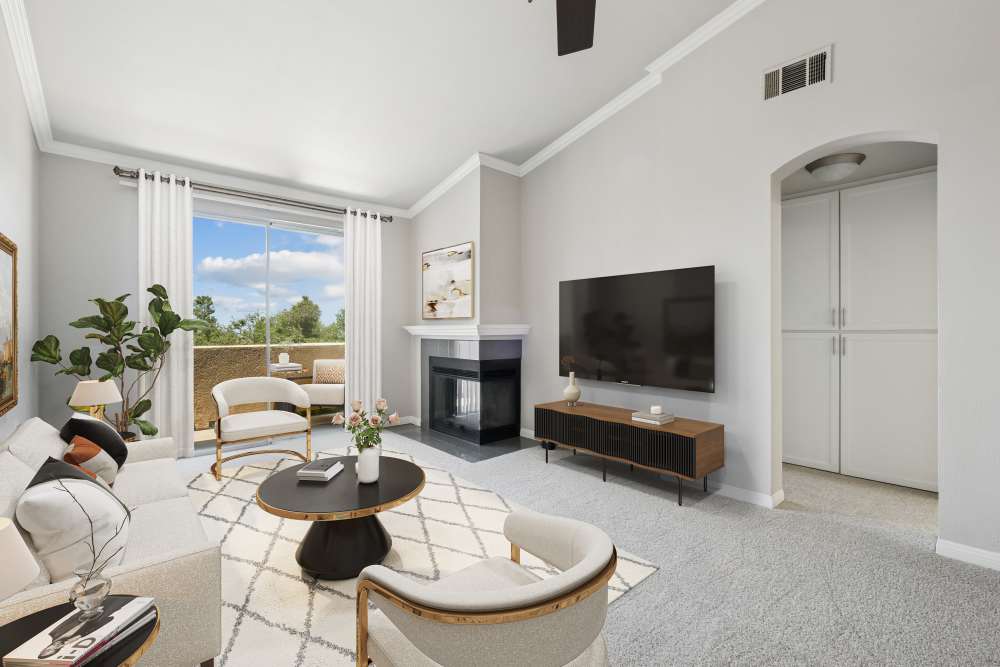 Bright and spacious living room with vaulted ceilings at Paloma Summit Condominium Rentals in Foothill Ranch, California