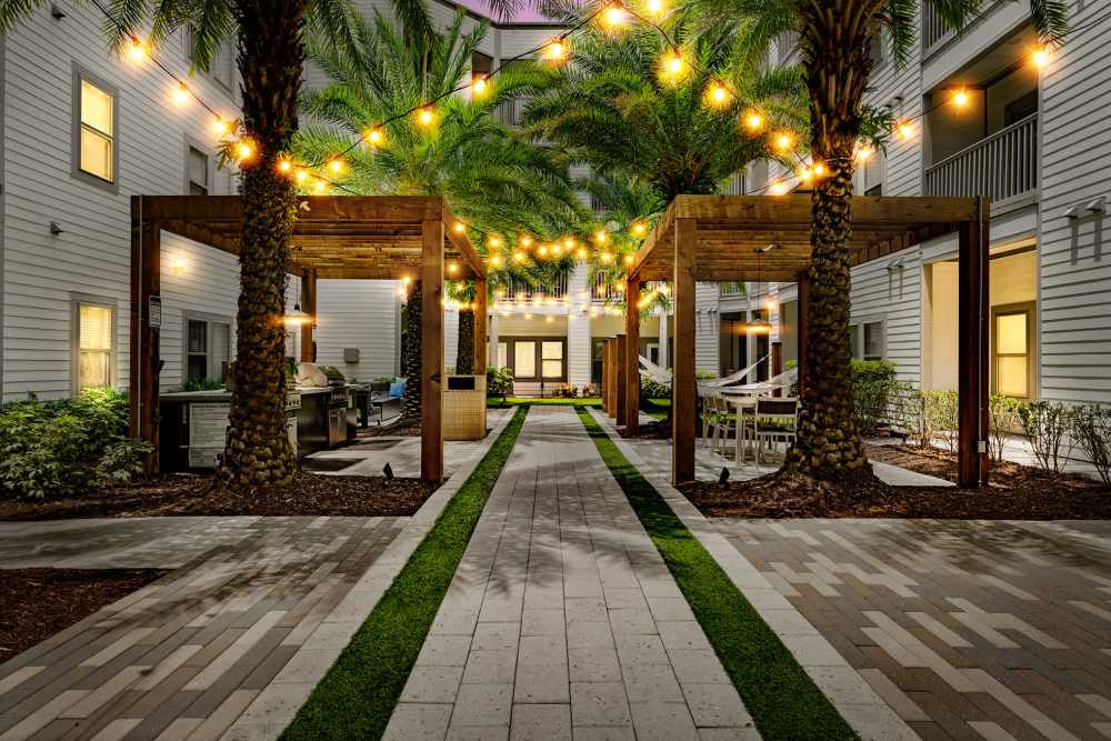 Outdoor courtyard with hammocks at SoBA Apartments in Jacksonville, Florida