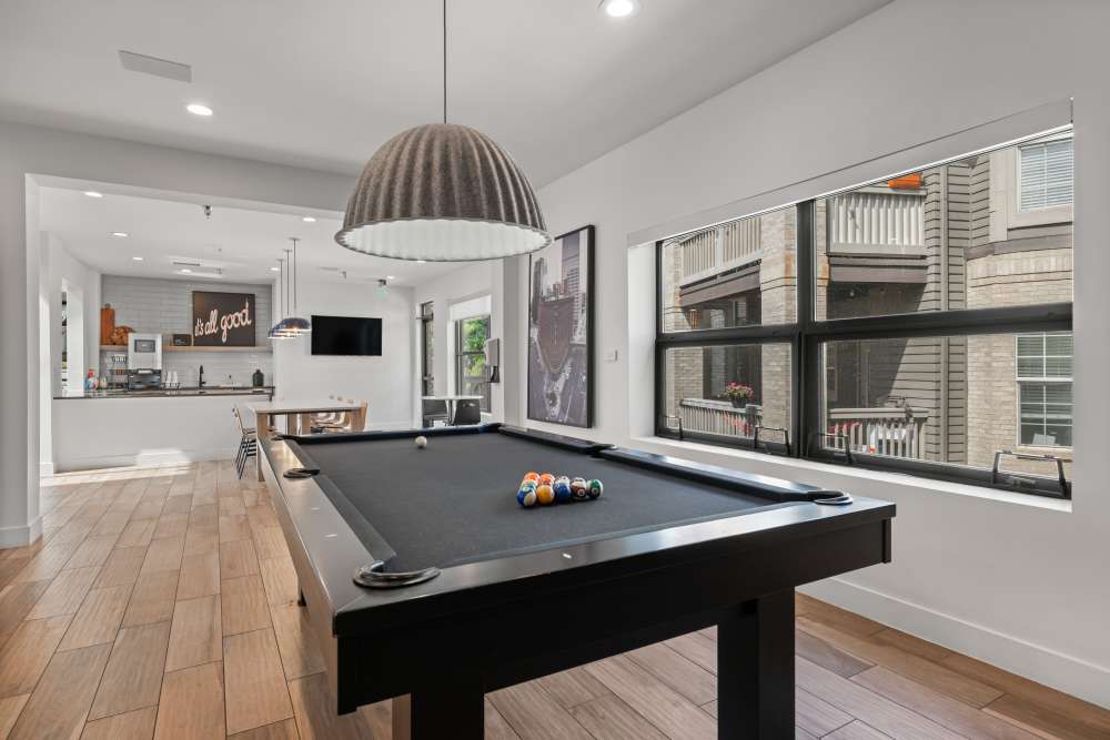 Game room with billiards at Isabella Apartment Homes in Greenwood Village, Colorado