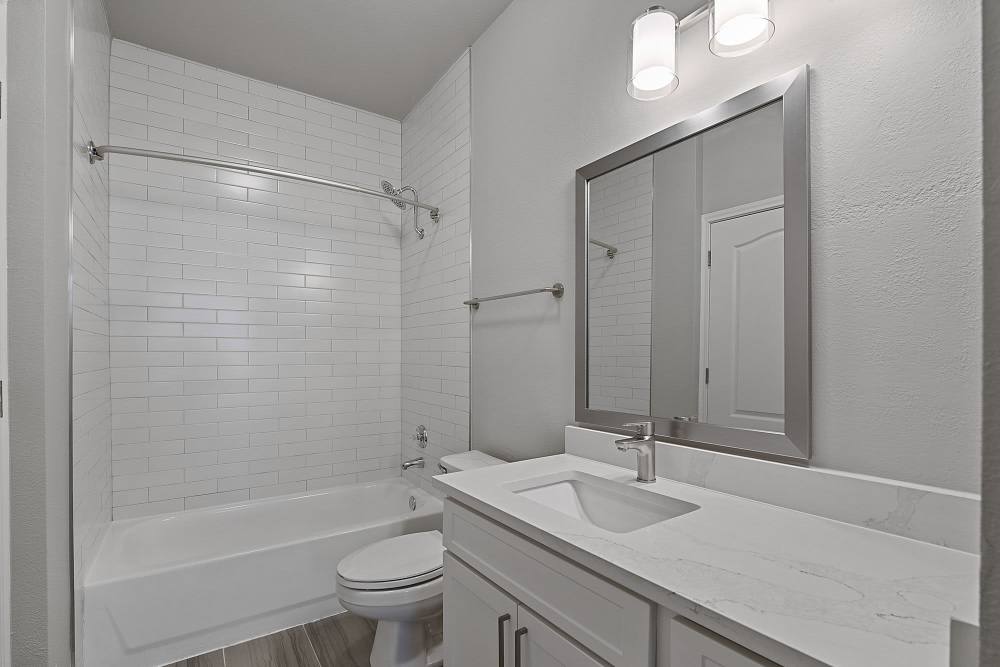 Bright bathroom with a mirror at Lyndon in Houston,Texas