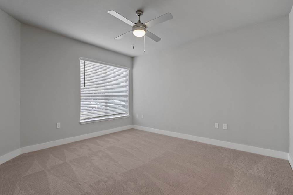 Unfurnished apartment bedroom with a window at Lyndon in Houston,Texas