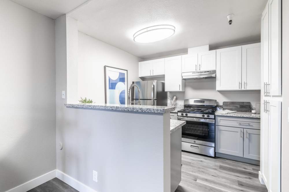 Spacious and equipped kitchen at Gateway Apartments in San Leandro, California