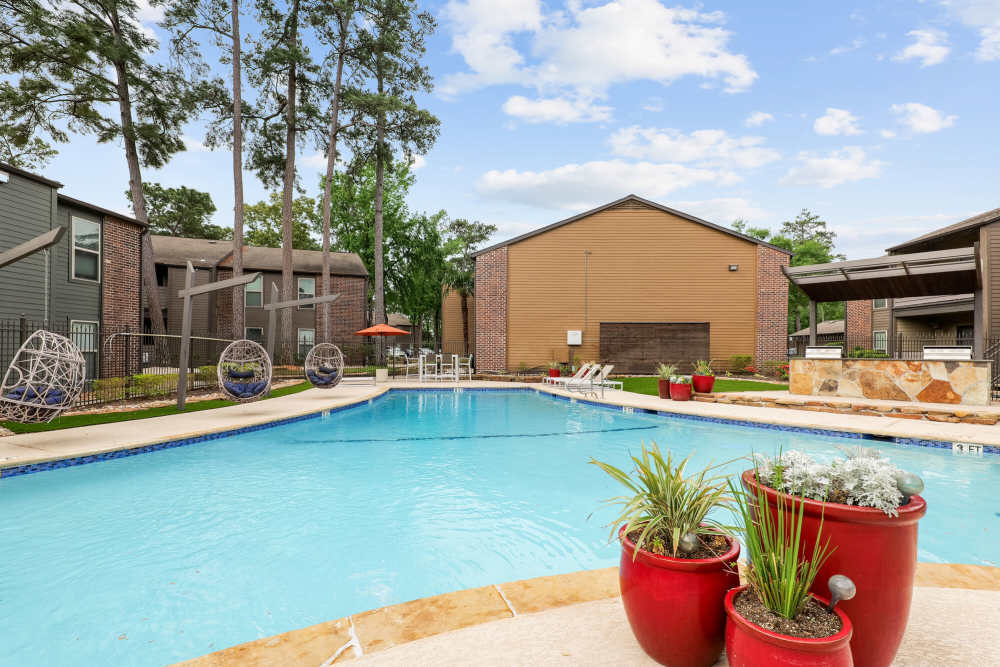 Egg shape hanging chair near pool  at Lexington in The Woodlands, Texas