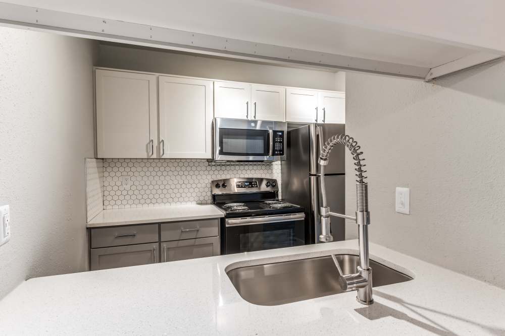 Kitchen with sink at Lexington in The Woodlands, Texas
