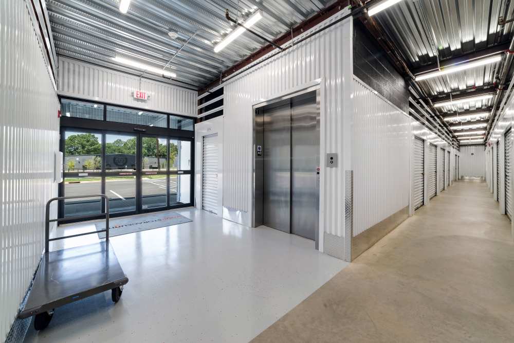Family moving items into their unit at Your Storage Units Mauldin Road in Greenville, South Carolina