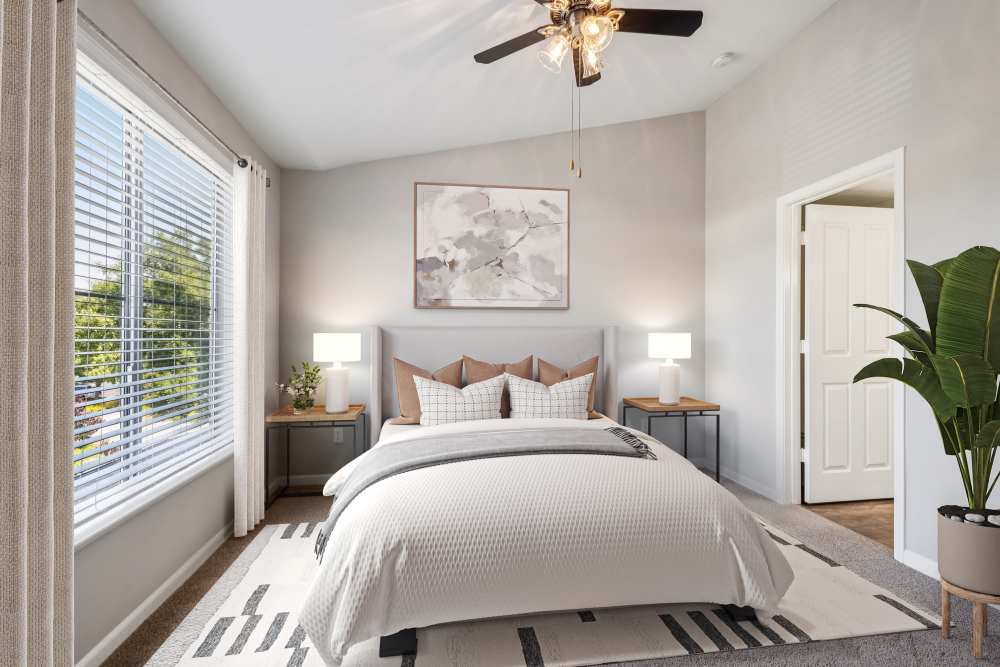 Bedroom with vaulted ceilings and ensuite bathroom at Azure Apartment Homes in Petaluma, California