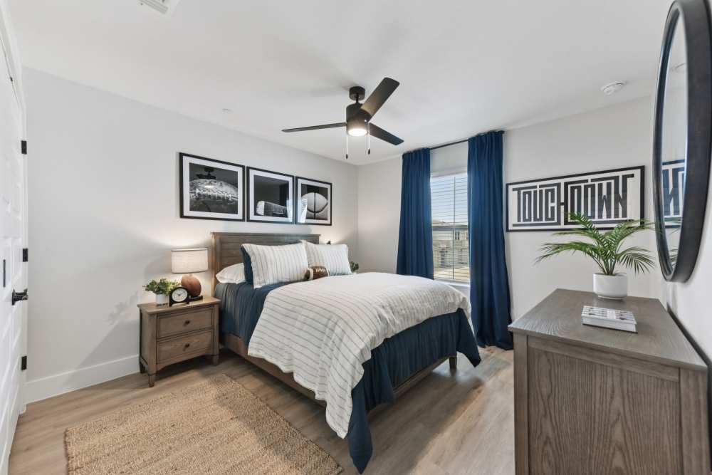 Bedroom with ceiling fan at BB Living Easton Park in Austin, Texas