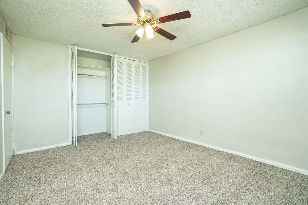 Bedroom with a ceiling fan at Gold Talon in Universal City, Texas
