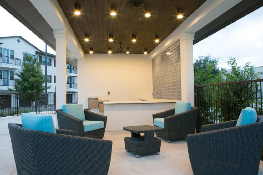 Charming lounge area with cozy seating and ambient lighting at Alcove at Alamo Heights in San Antonio, Texas