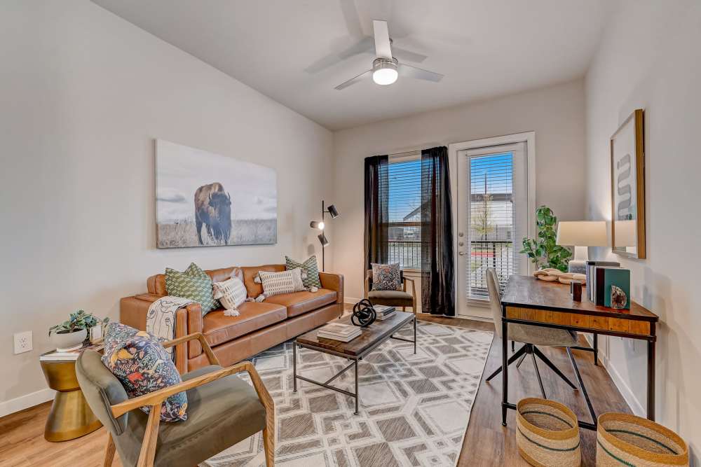Living room with couch at The Springs at Georgetown in Georgetown, Texas