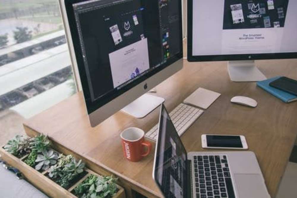 Desktop and laptop on a table at Commerce Senior in Los Angeles, California