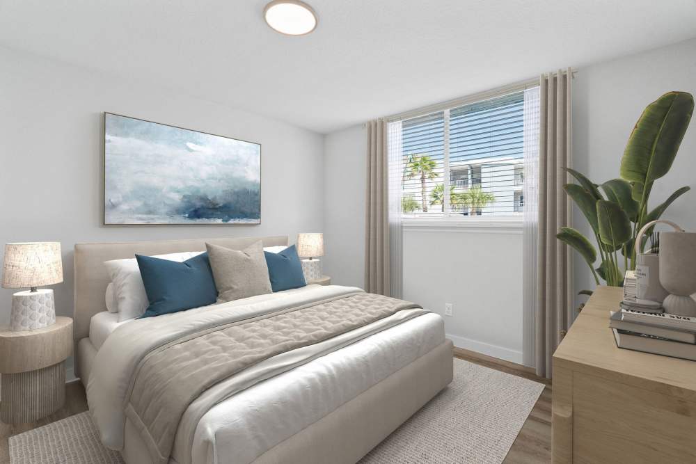 Apartment bedroom with closet and hardwood floors at Waters Pointe in South Pasadena, Florida