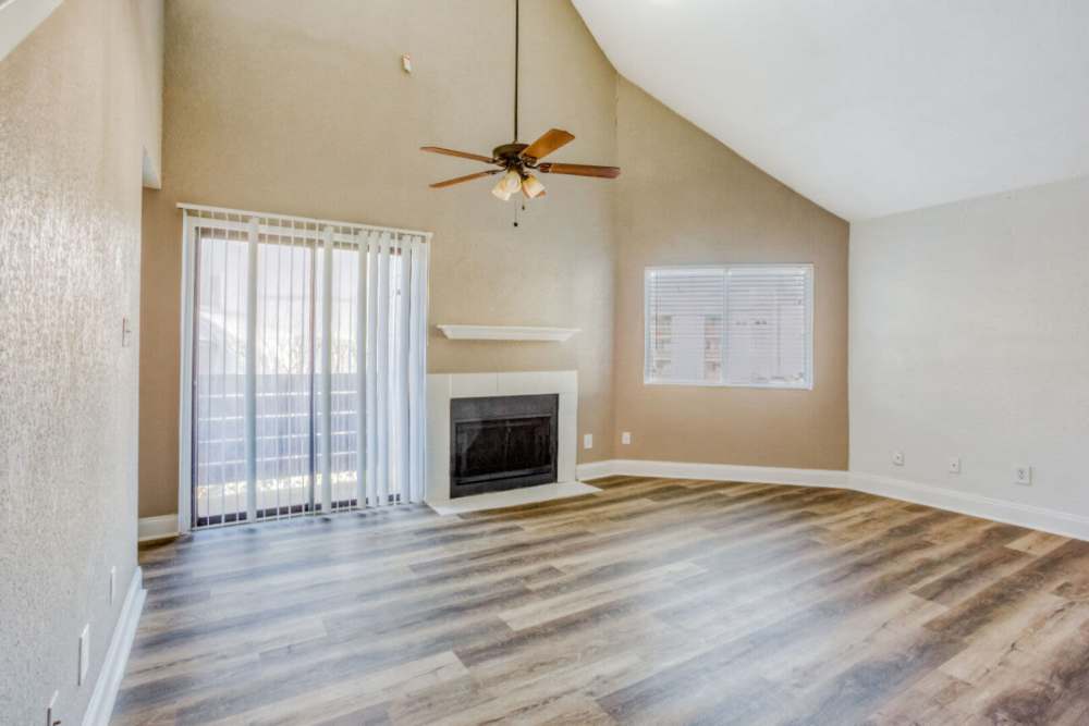 Brightly lit and open living room at Hubbards Ridge in Garland, Texas