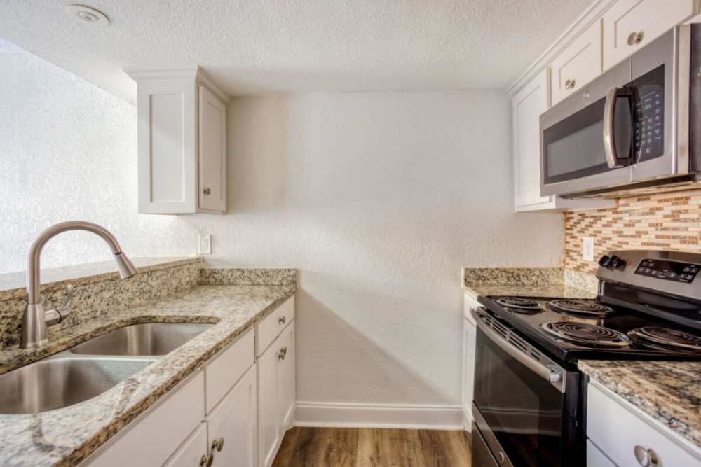 Spacious island kitchen at  at Hubbards Ridge in Garland, Texas