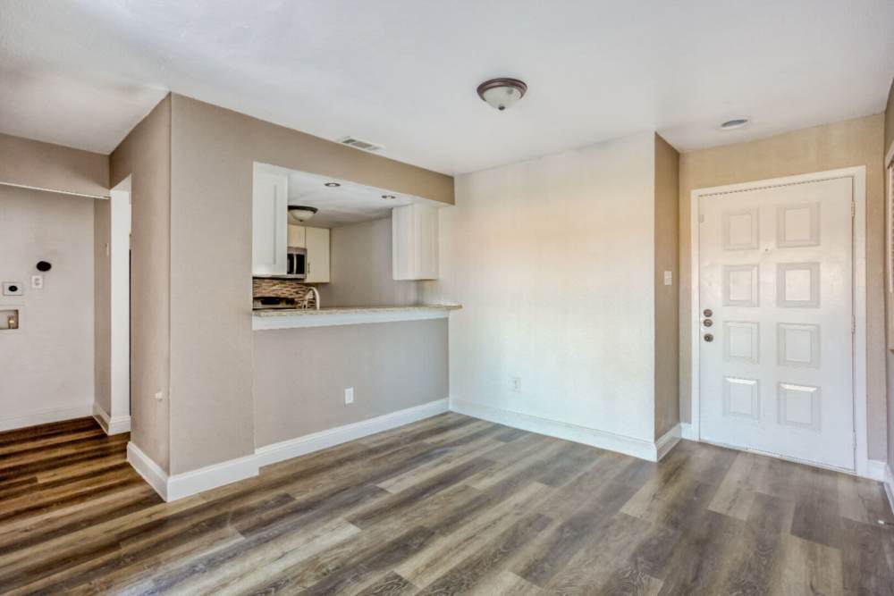 Open layout of kitchen and living room at Hubbards Ridge in Garland, Texas