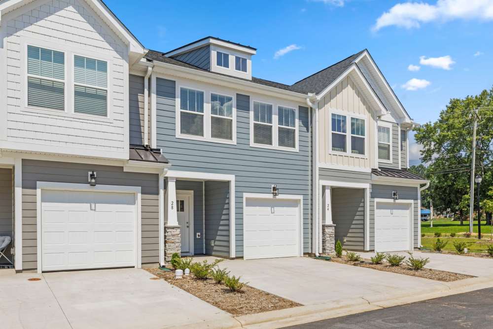 Modern townhomes with garages at Artisan Living Mills River in Mills River, North Carolina