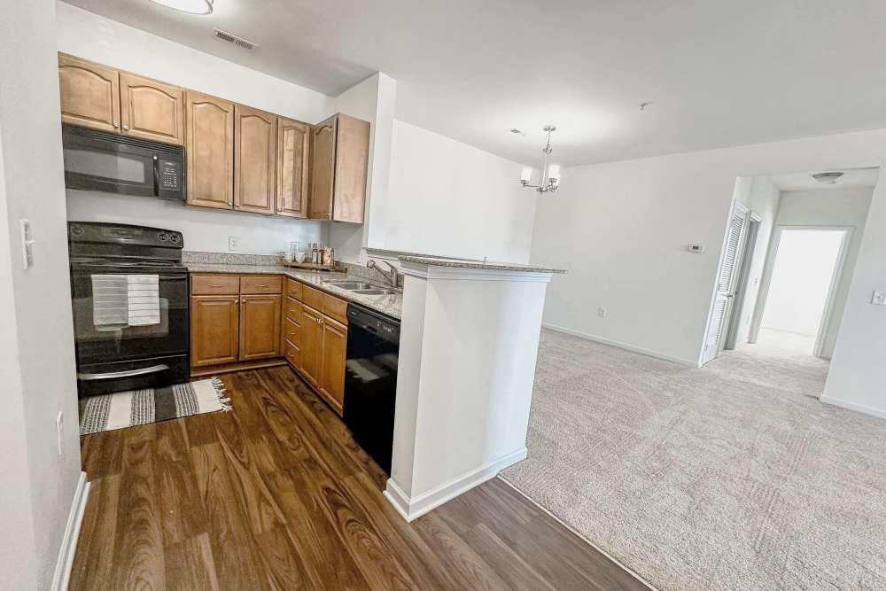 Kitchen and living room in one picture at Windsor Upon Stonecrest in Burlington,North Carolina