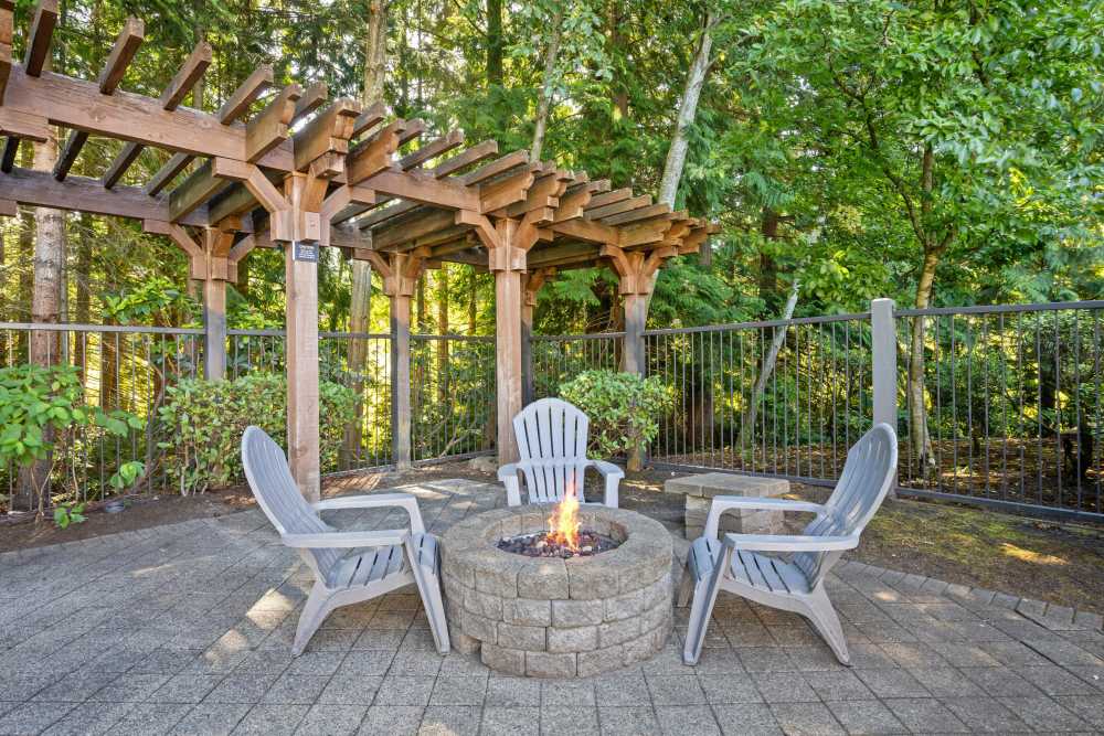 The covered community grilling area at Wildreed Apartments in Everett, Washington