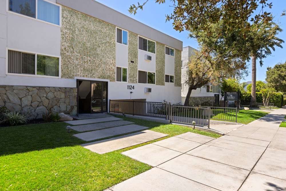 Exterior view of the building showing windows, entry and the walkway at The Indie Glendale Collection in Glendale, California