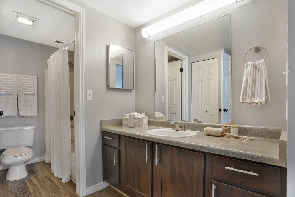 Bathroom with a large vanity at Royal Farms Apartments in Salt Lake City, Utah