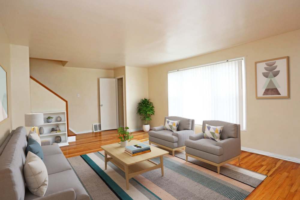 Spacious living room with a large window at Central Park in Park Forest,Illinois